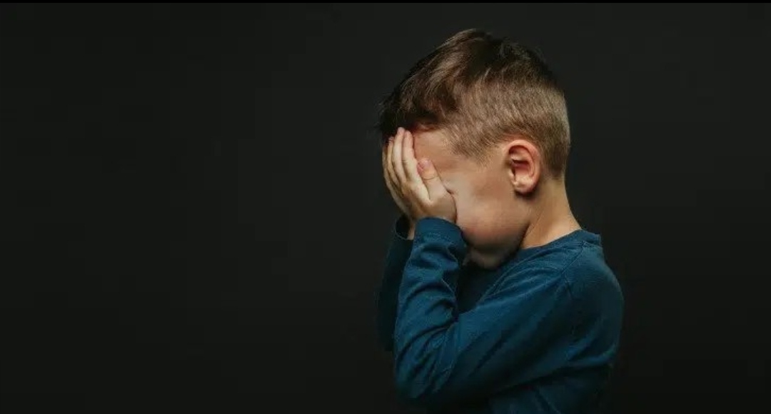 Demenza infantile e danno cerebrale irreversibile a seguito di inoculazione